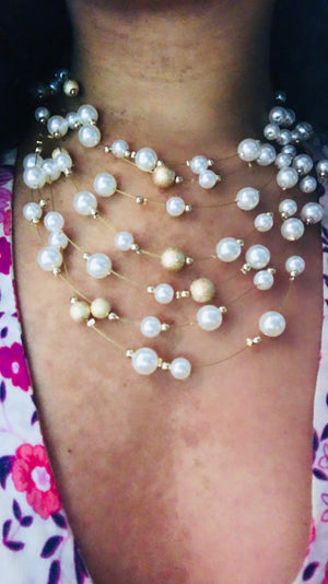 Multi layer pearl necklace
